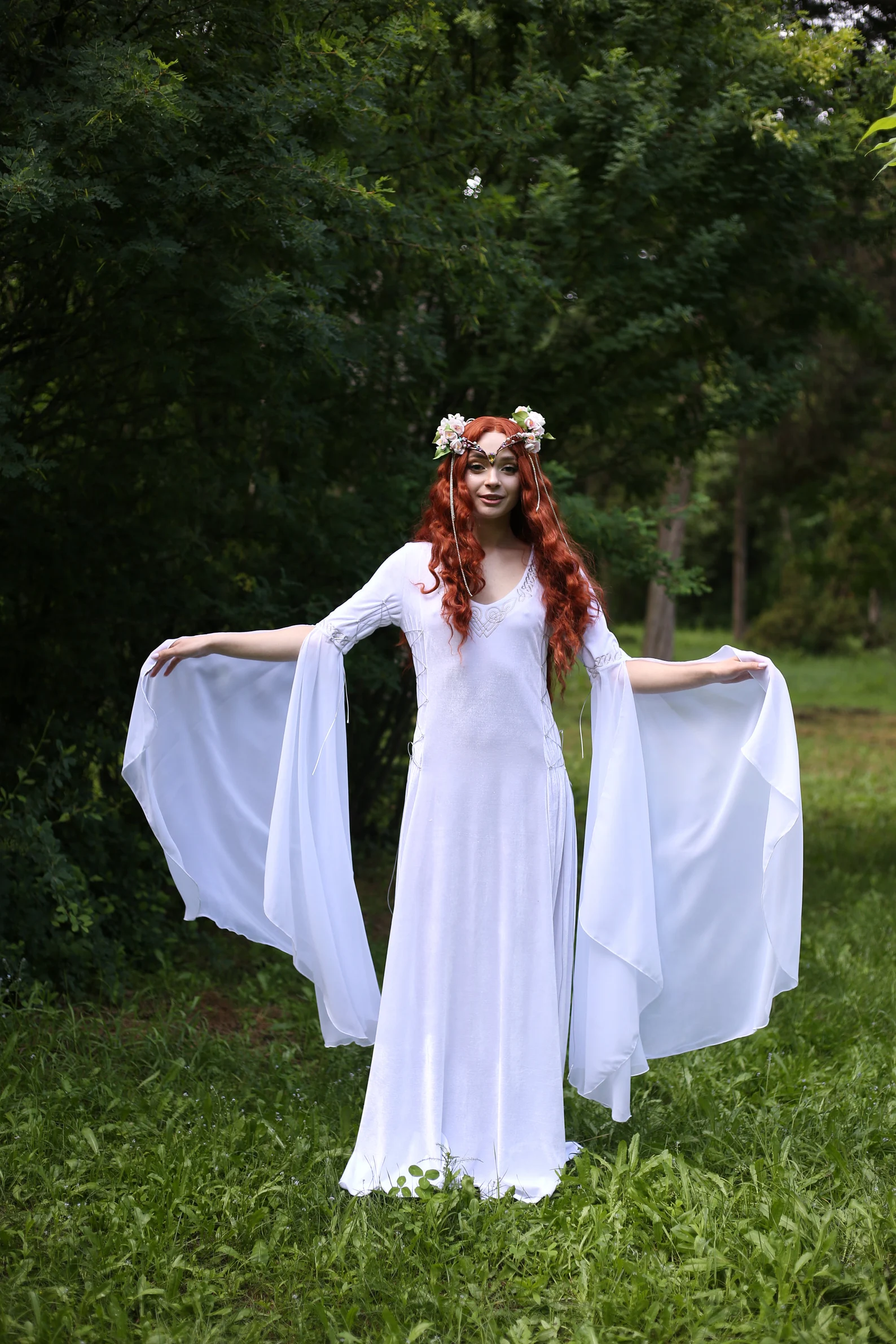 Woman in a white costume.