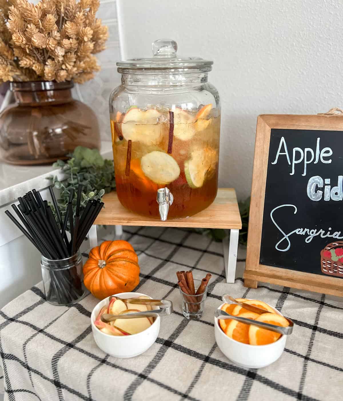 Drink dispenser with apple cider sangria.