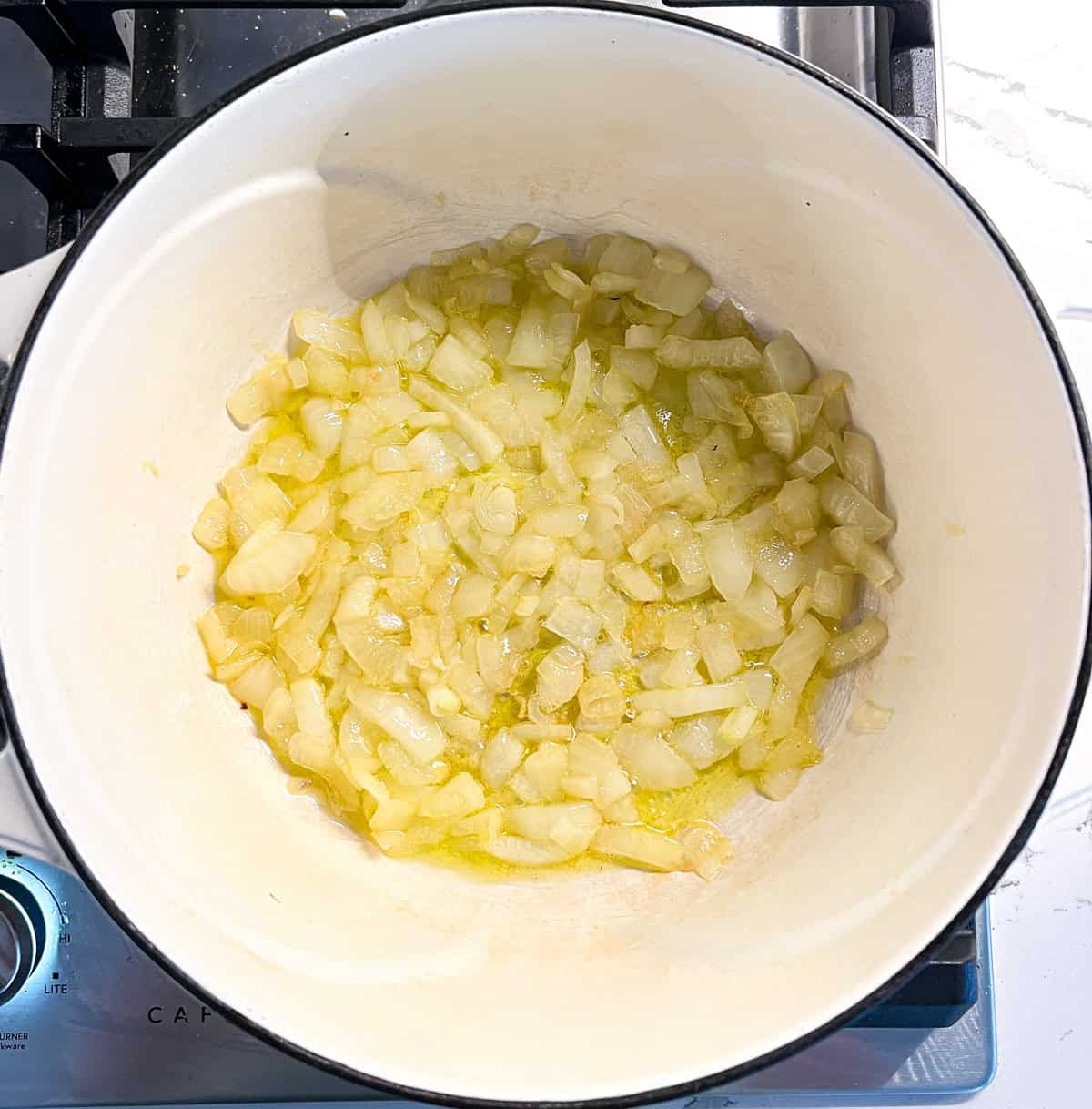 Simmering onions in a dutch oven.