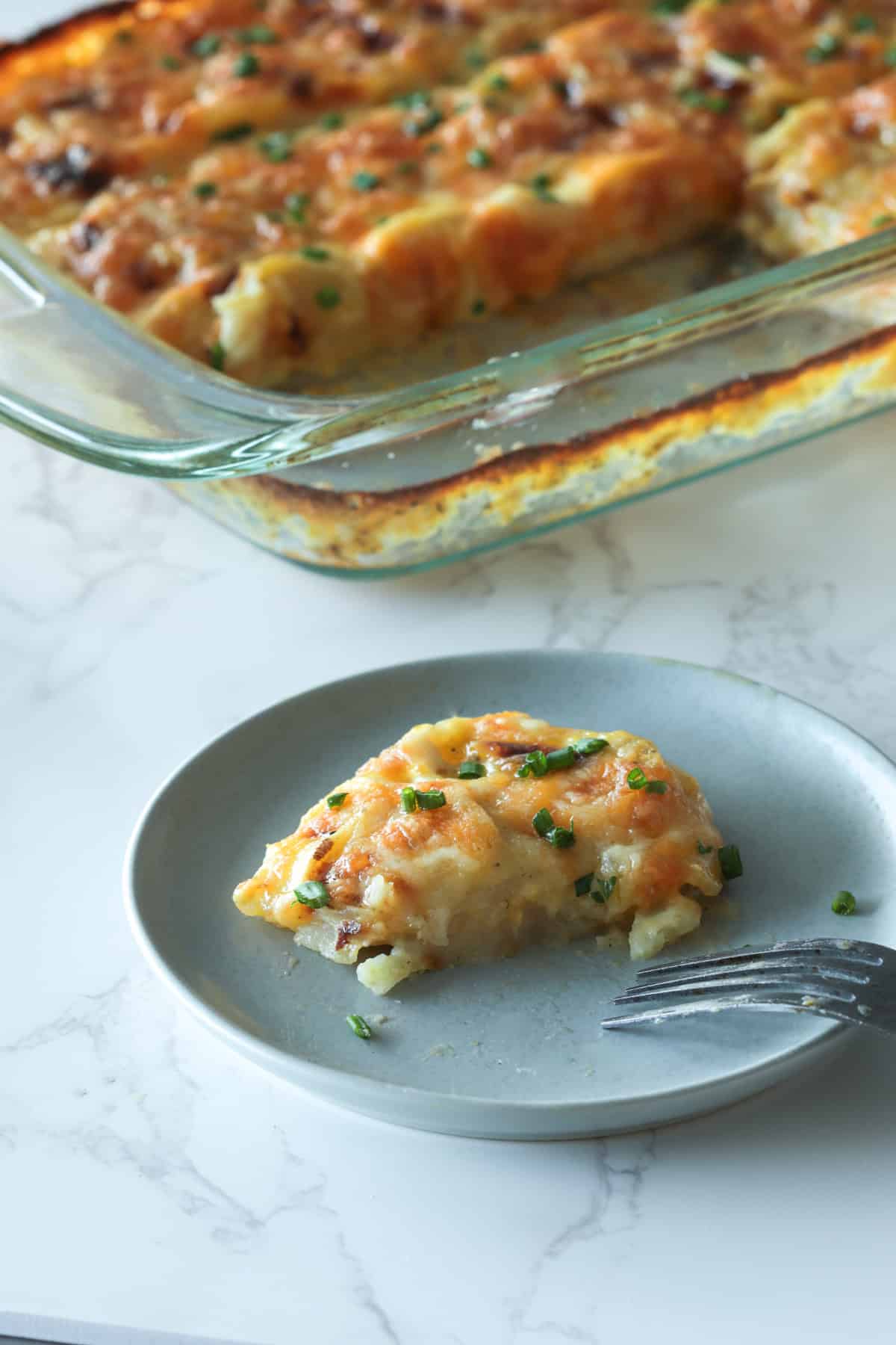 Scalloped potatoes side dish on a plate.