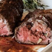 Tenderloin roast on a plate.