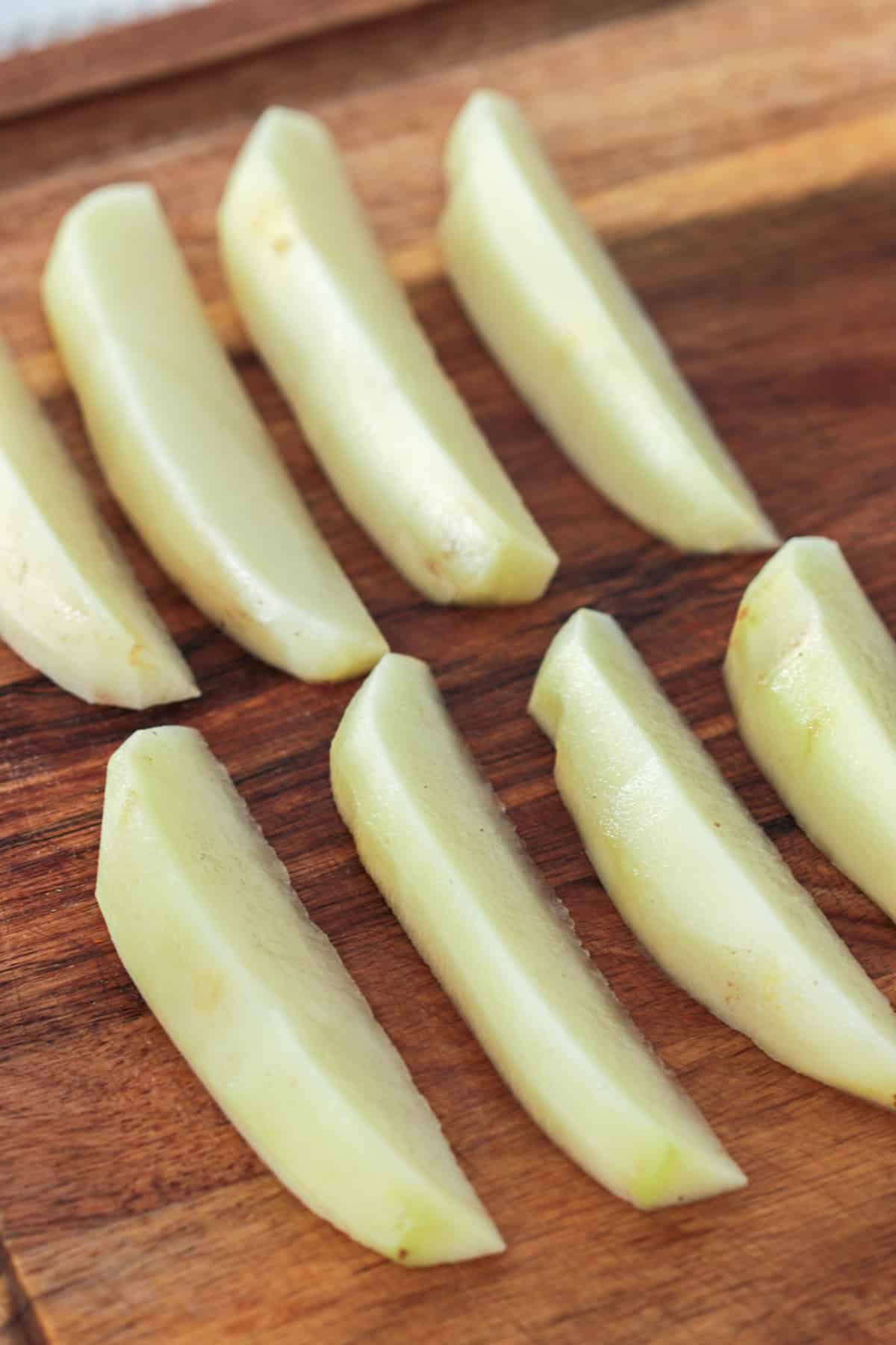 Potatoes cut into wedges.