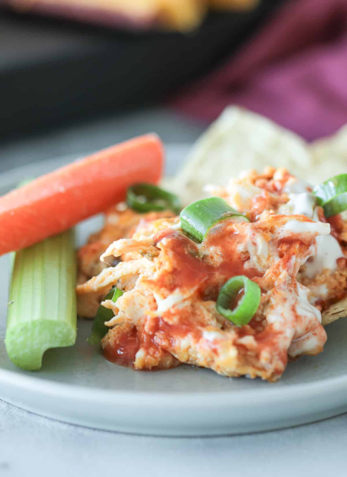 Buffalo chicken dip on a plate.