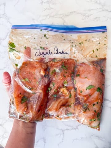 Marinated chicken in a freezer bag.