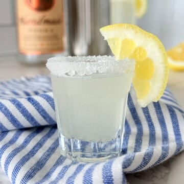 Lemon drop shot with lemon wedge.