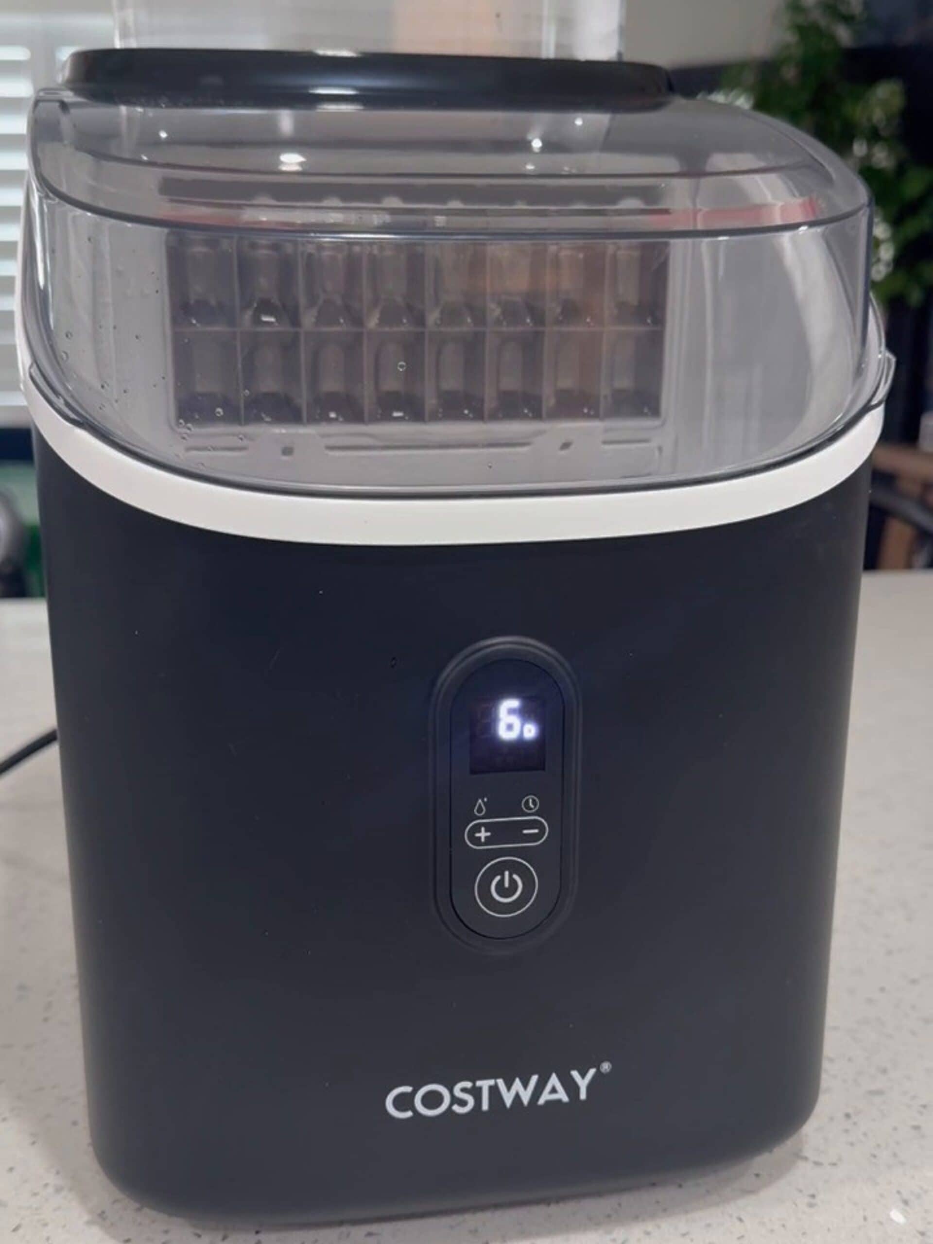 Front view of the COSTWAY countertop ice maker showing the digital display and control panel.