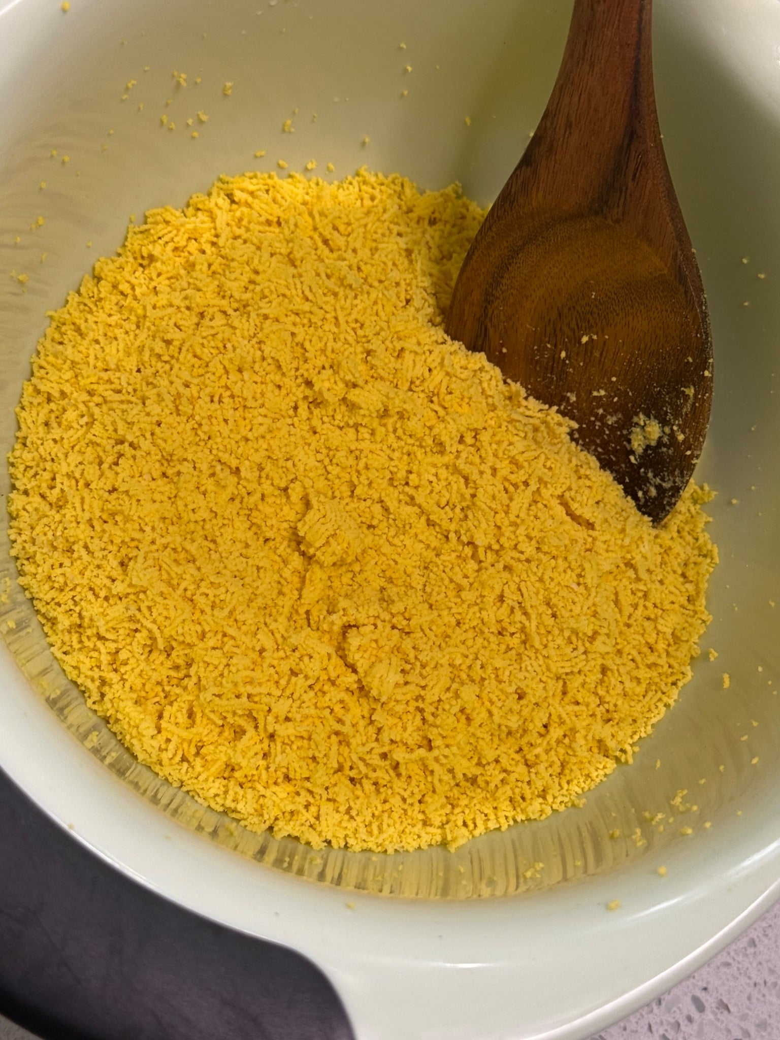 Finely sieved egg yolks ready to mix into smooth deviled egg filling